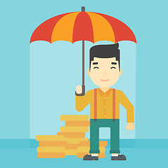 Image showing Businessman with umbrella protecting money.