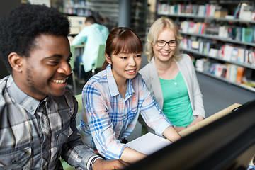 Image showing international students with computers at library