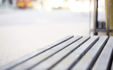 Image showing close up of wooden city street bench