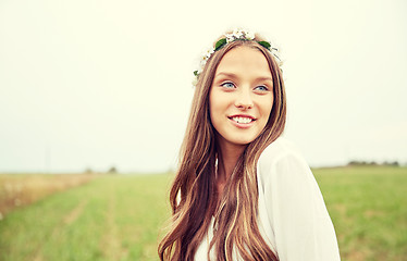 Image showing smiling young hippie woman on cereal field