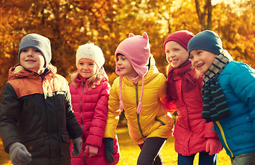 Image showing group of happy children having fun in autumn park