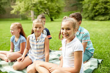 Image showing group of happy kids or friends outdoors