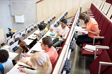 Image showing group of students writing test at lecture hall