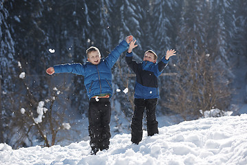 Image showing kids playing with  fresh snow