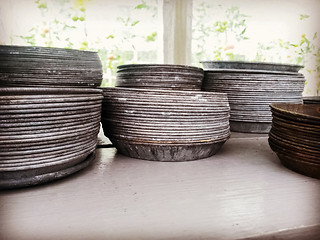 Image showing Retro style metal plates for flower pots