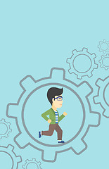 Image showing Businessman running inside the gear.