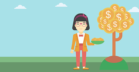 Image showing Business woman catching dollar coins.