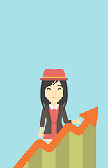 Image showing Business woman with growing chart.