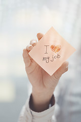 Image showing Love my job text on adhesive note