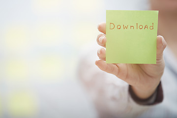 Image showing Download text on adhesive note