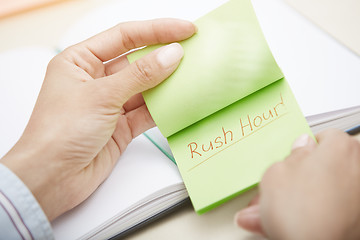 Image showing Rush hour text on adhesive note