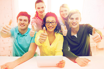 Image showing smiling students with tablet pc computer at school