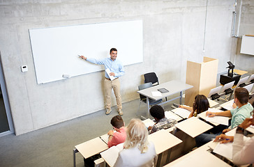 Image showing group of students and teacher at lecture