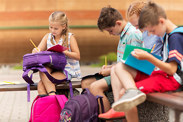 Image showing group of happy elementary school students outdoors