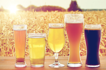 Image showing close up of different beers in glasses on table