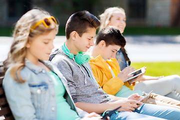 Image showing happy teenage boy with tablet pc and headphones