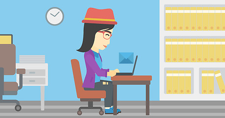 Image showing Business woman receiving or sending email.