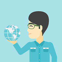 Image showing Businessman holding Earth globe.