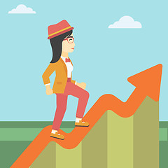 Image showing Business woman running along the growth graph.