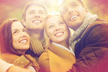 Image showing group of friends having fun in autumn park