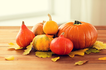 Image showing close up of pumpkins on wooden table at home