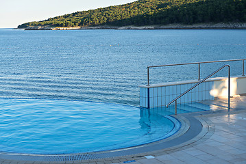 Image showing Infinity pool and mountains