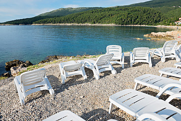 Image showing Pebble beach with chaise-longues in Istria