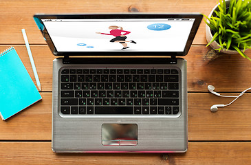 Image showing close up of laptop computer with fitness app