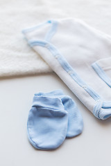 Image showing close up of baby boys clothes for newborn on table