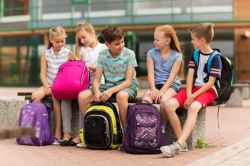 Image showing group of happy elementary school students talking