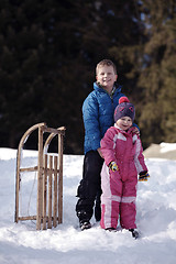 Image showing Brother and sister portrait in winter time