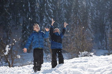 Image showing kids playing with  fresh snow