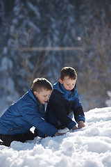 Image showing kids playing with  fresh snow