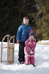 Image showing Brother and sister portrait in winter time
