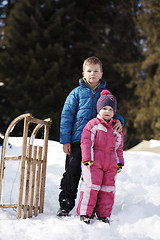 Image showing Brother and sister portrait in winter time