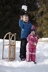 Image showing Brother and sister portrait in winter time