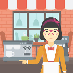 Image showing Barista standing near coffee machine.