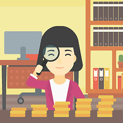 Image showing Woman with magnifier looking at golden coins.