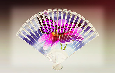 Image showing Colorful hand fan . 3D illustration. Vintage style.