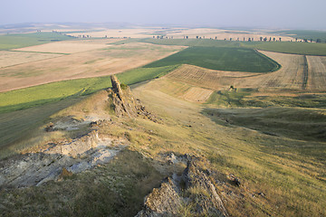 Image showing Beautiful rocks and golden fields