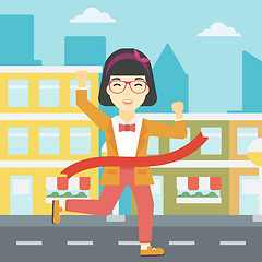 Image showing Business woman crossing finish line.