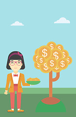 Image showing Business woman catching dollar coins.