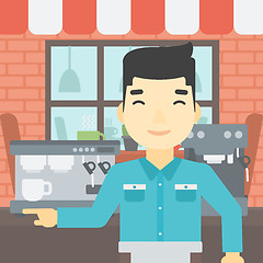 Image showing Barista standing near coffee machine.