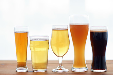 Image showing close up of different beers in glasses on table