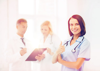 Image showing young female doctor with stethoscope