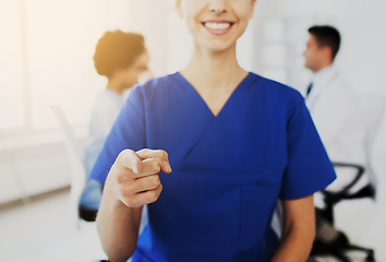 Image showing close up of nurse pointing on you at hospital