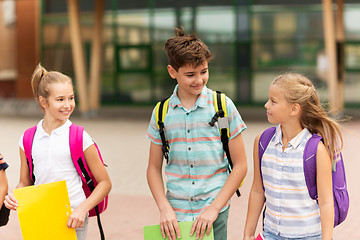 Image showing group of happy elementary school students walking