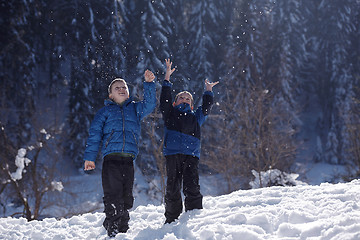 Image showing kids playing with  fresh snow