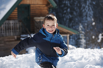 Image showing kids playing with  fresh snow