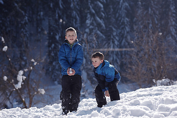 Image showing kids playing with  fresh snow